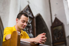 young-man-praying-church-handsome-41152818