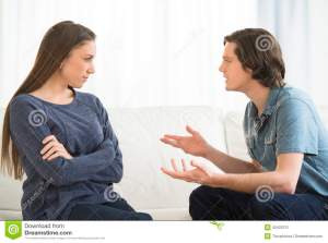 man-explaining-woman-arguing-living-room-young-men-women-40422131